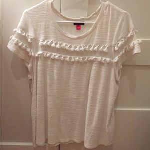 White tshirt with cute accessories.
